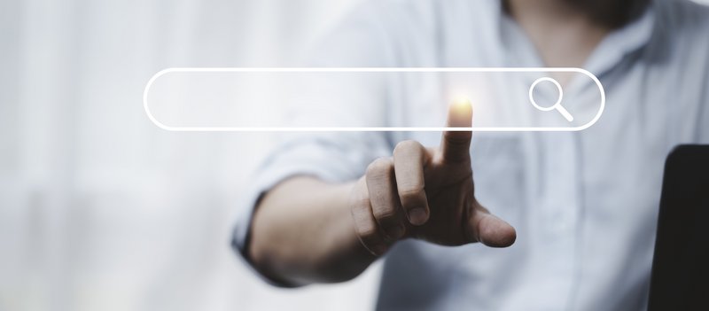 hand-touching-with-search-icon-search-engine-optimisation-seo-concept-find-information-by-internet-connection